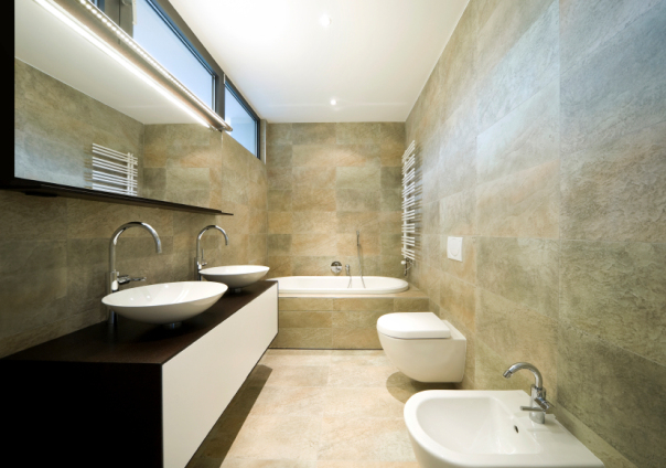 Modern bathroom with stone walls and double sink