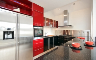 red and stainless kitchen