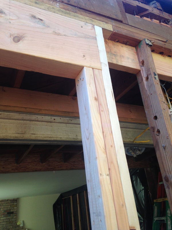 partial construction of door with wood beams