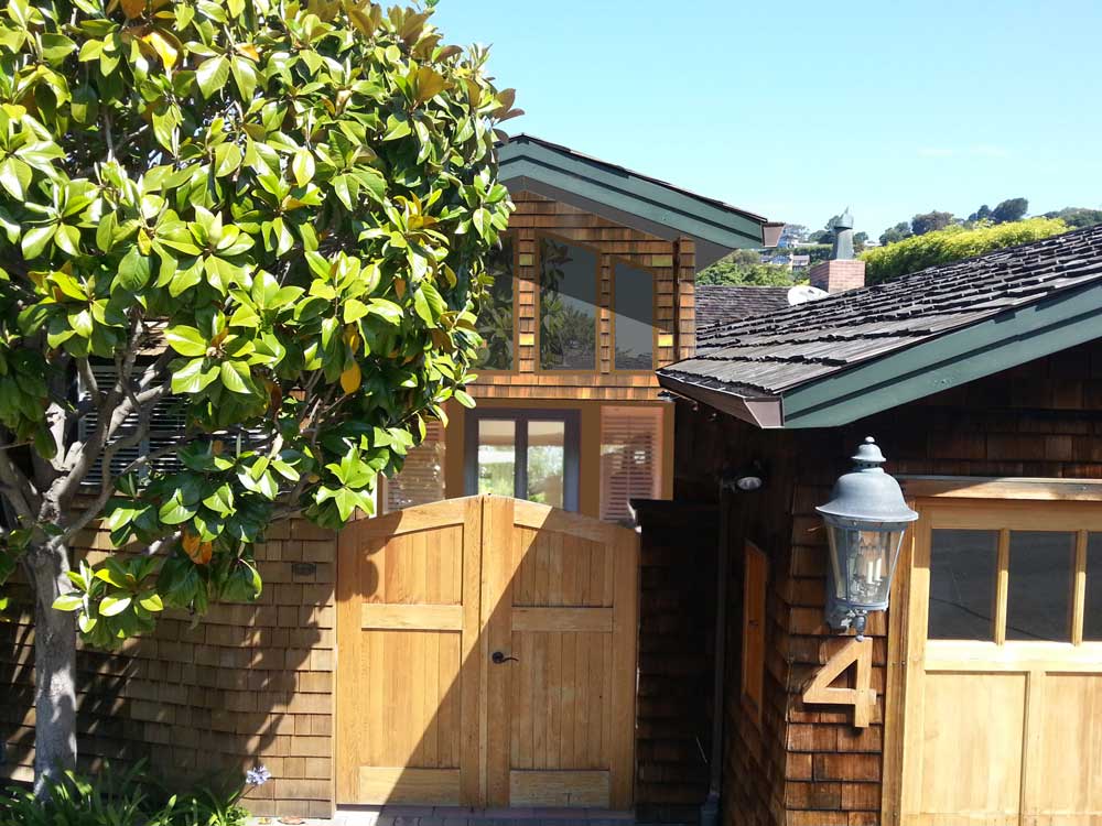 Exterior of craftsman-style home front gate and garage