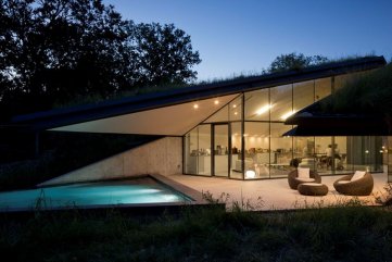 modern asymetrical home with pool