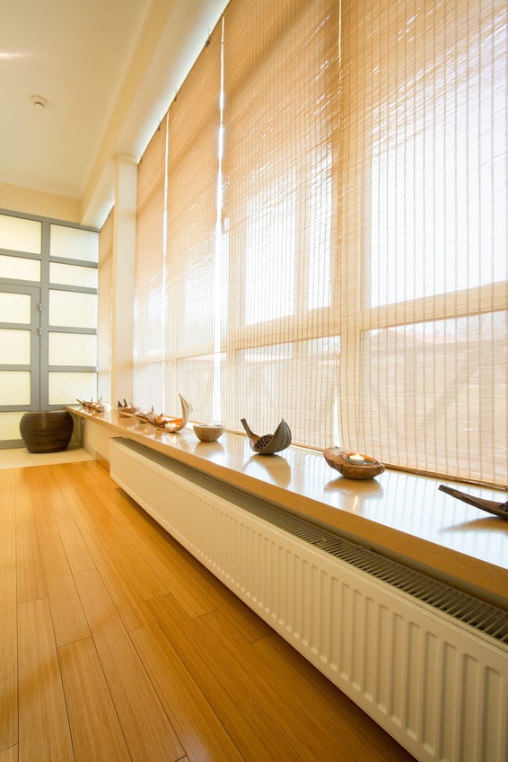 Bright room with solar shades on windows