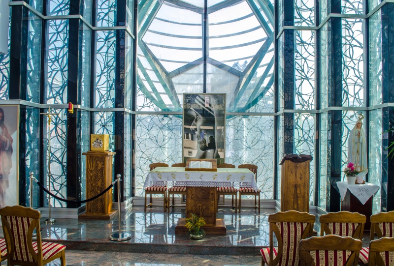 interior of modern chapel with glass walls