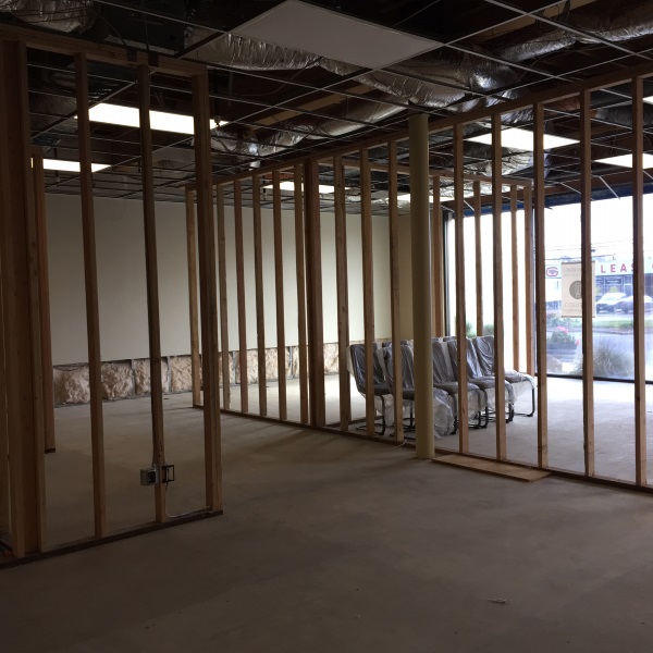 framed interior of showroom in construction