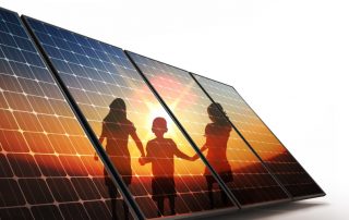 family next to solar panels