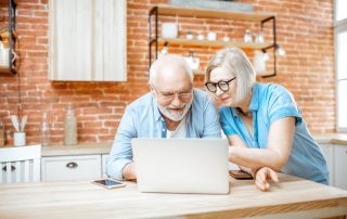 older couple looking at computer