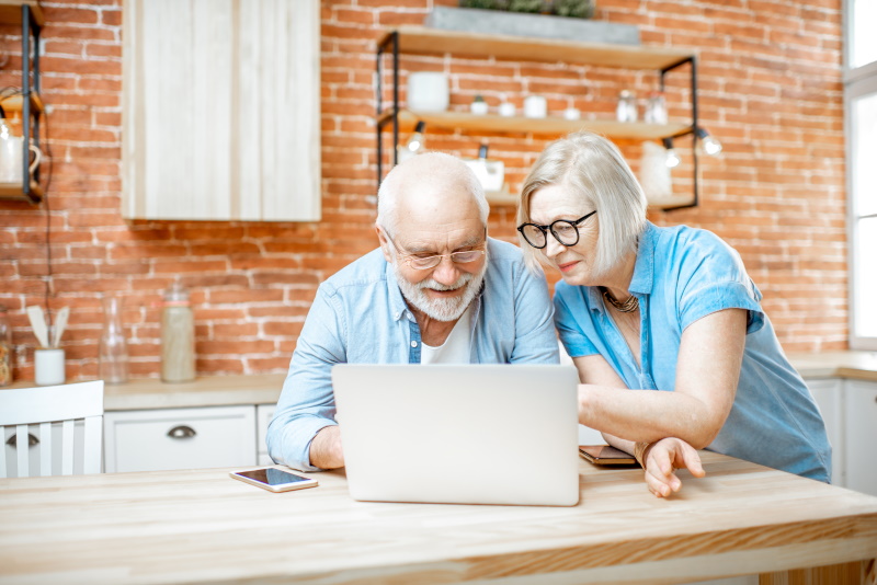 older couple looking at computer