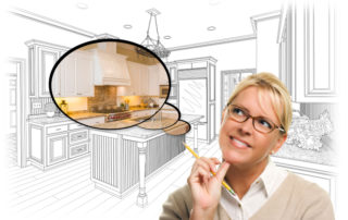 Blond woman with glasses thinking. Thought bubble contains image of modern kitchen