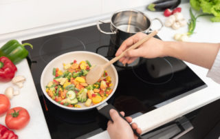 Fresh vegetables fried in a pan. Healthy nutrition concept. Healthy nutrition concept