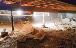 A cleanup of the vapor barrier in a crawlspace