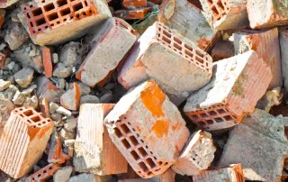 pile of broken and discarded concrete blocks