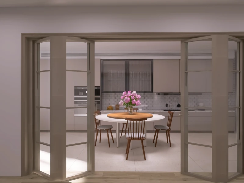 Room with floor-to-ceiling patio doors opening to a round white table with wood chairs and a bouquet of pink flowers.